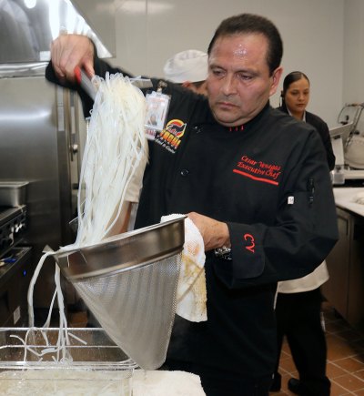 Tachi Palace Hotel & Casino opens newest restaurant in third floor Casino of the Moon Sous Chef Cesar Venegas preparses a dish in the kitchen.
